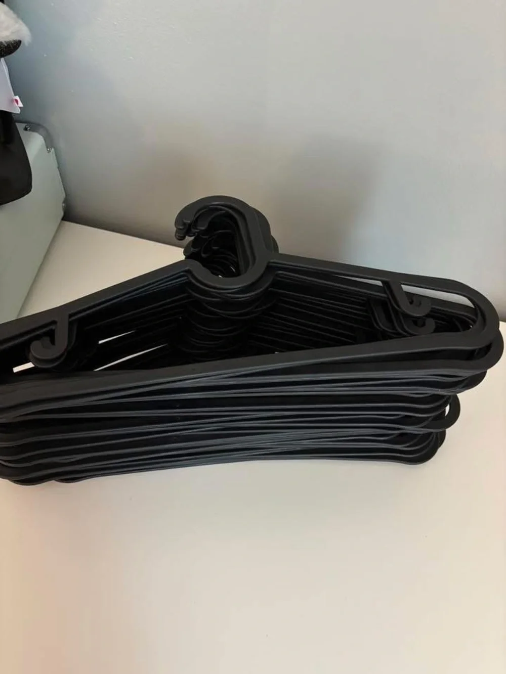 43 Set of Black Plastic Clothing Hangers